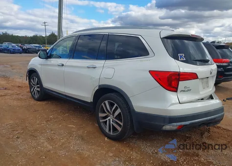 2016 Honda Pilot Touring z USA, uszkodzony, nr VIN 5FNYF6H92GB040275